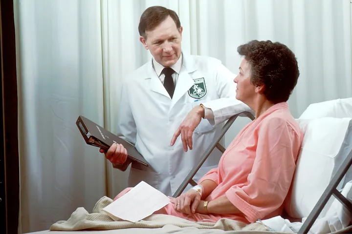 Speech therapist working with a client in a consultation room